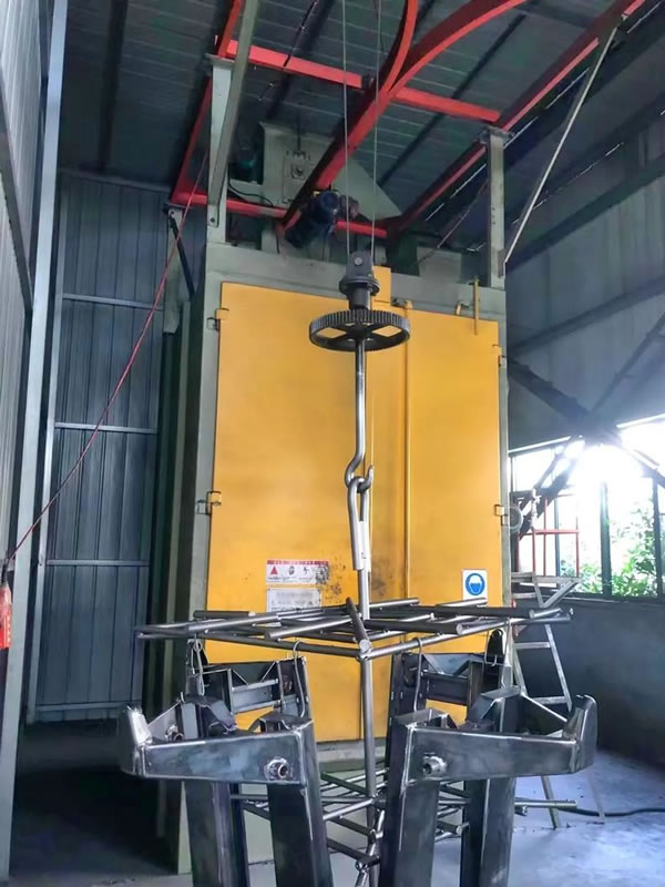 Hook type shot blasting machine