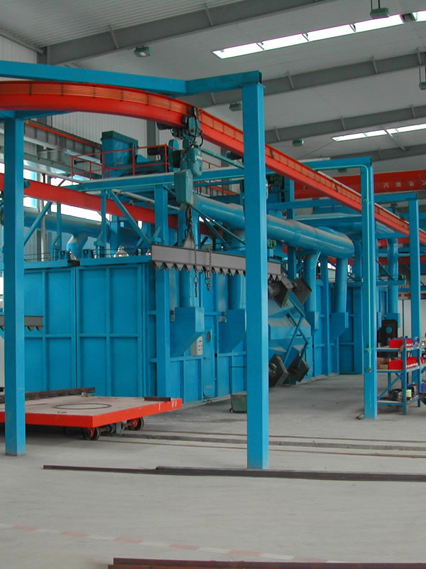 Sling shot blasting machine